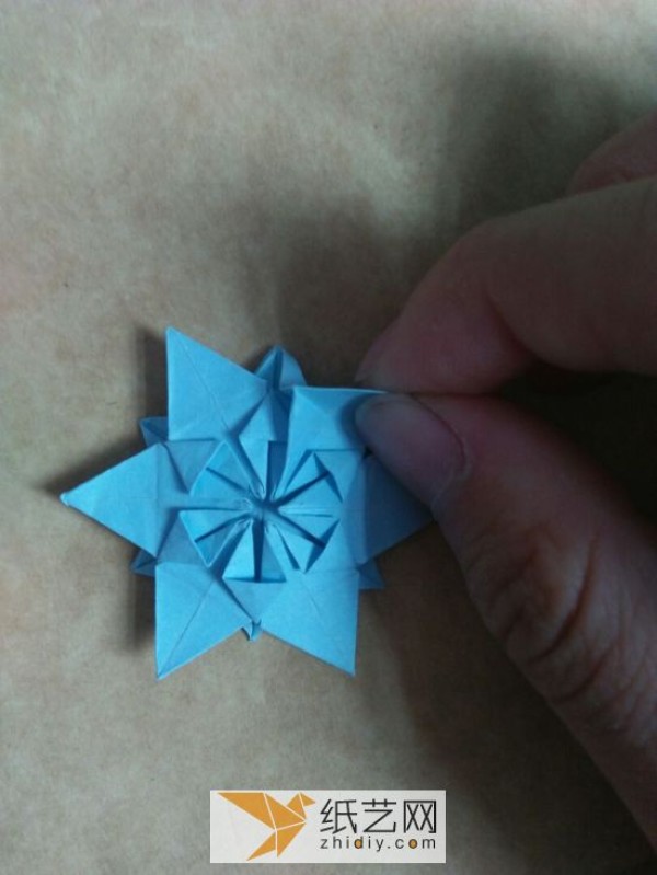 You can also fold a piece of paper into three-dimensional snowflakes!