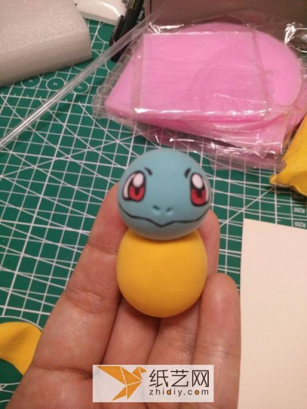 Illustrated tutorial on making DIY Pokemon Squirtle from clay. Cartoon dolls made of clay.