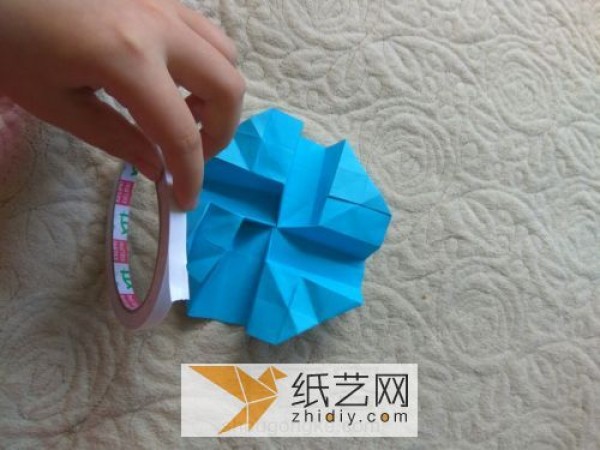 Improved Kawasaki Rose Folding Illustrated Tutorial. Actual photos teach you how to fold paper roses.