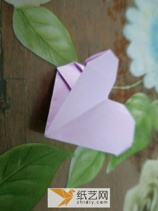 Origami tutorial with heartfelt love illustrations using skillful hands