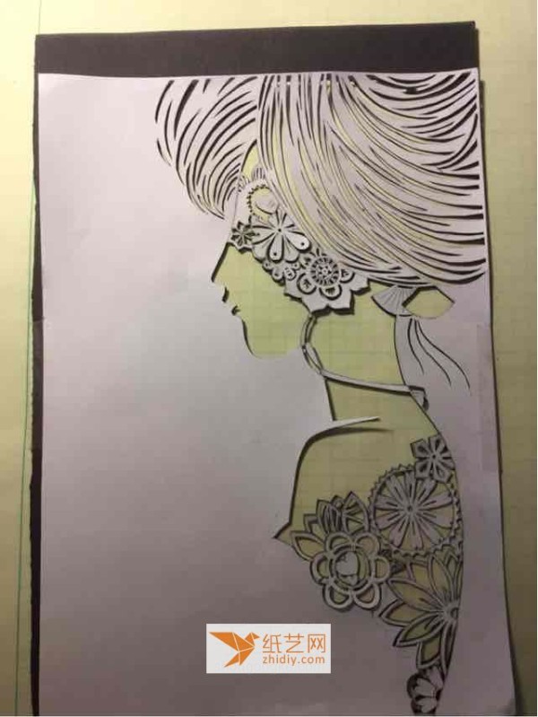 Three-dimensional handmade paper carving painting of beautiful girl