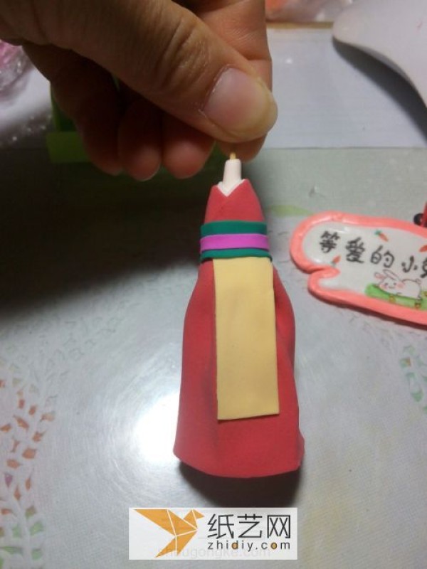 An ancient costume girl doll made of ultra-light clay as a Teacher’s Day gift