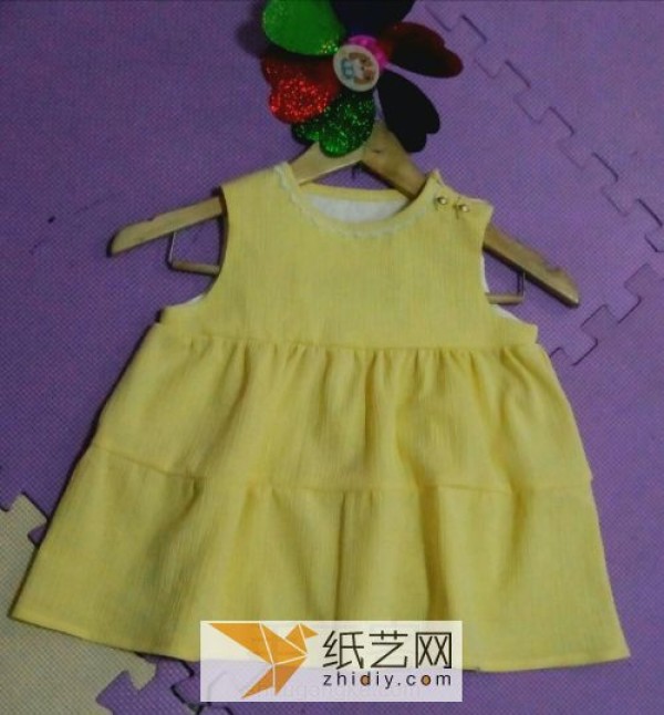 Mom is sending love on Children’s Day. Handmade fabric bright yellow dress.