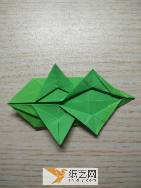 Tutorial on how to make an origami crocodile in Childrens Origami Collection