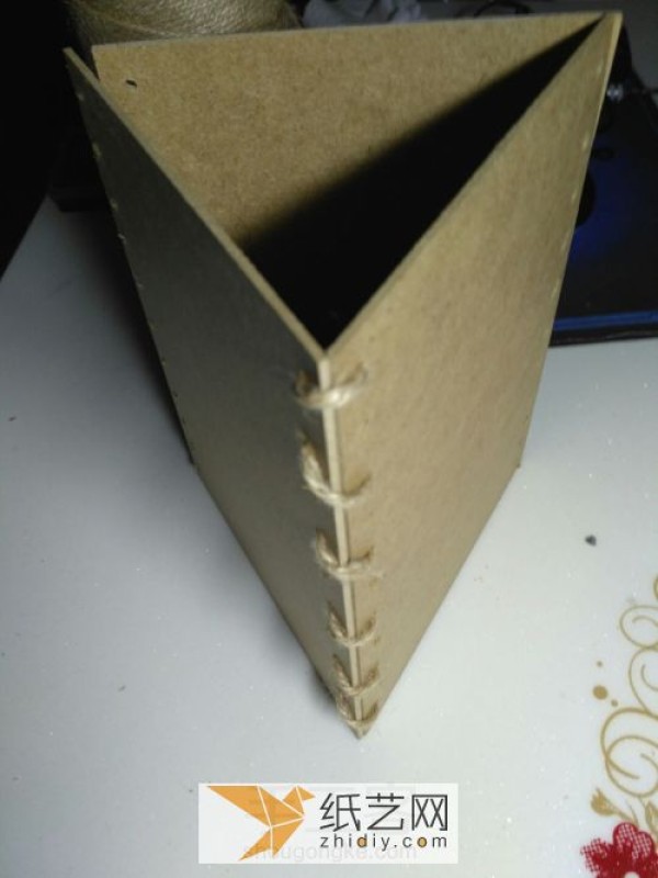 Cardboard turned into treasure and made into a pen holder as a Children’s Day gift