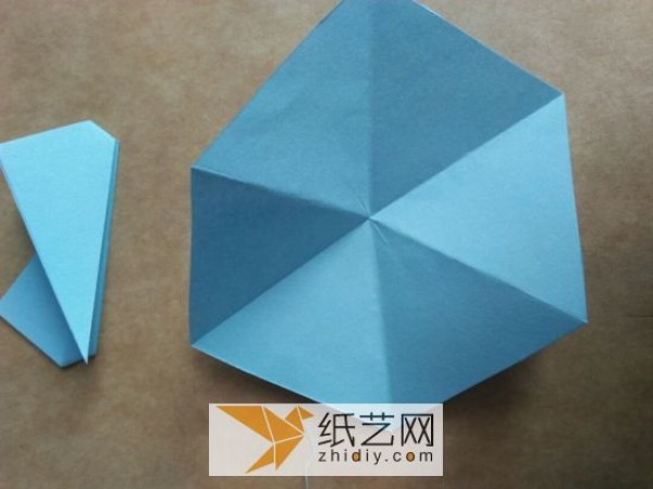 You can also fold a piece of paper into three-dimensional snowflakes!