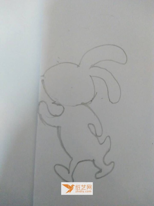 The little bunny cutout made in art class is used to glue on the Teachers Day greeting card