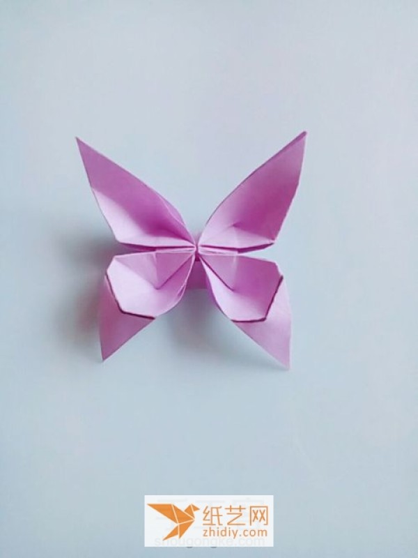 Origami swallowtail butterflies add the finishing touch to Christmas and New Year decorations