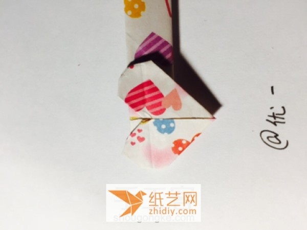 A little surprise for Valentines Day. Tutorial on how to make origami heart hairpins.