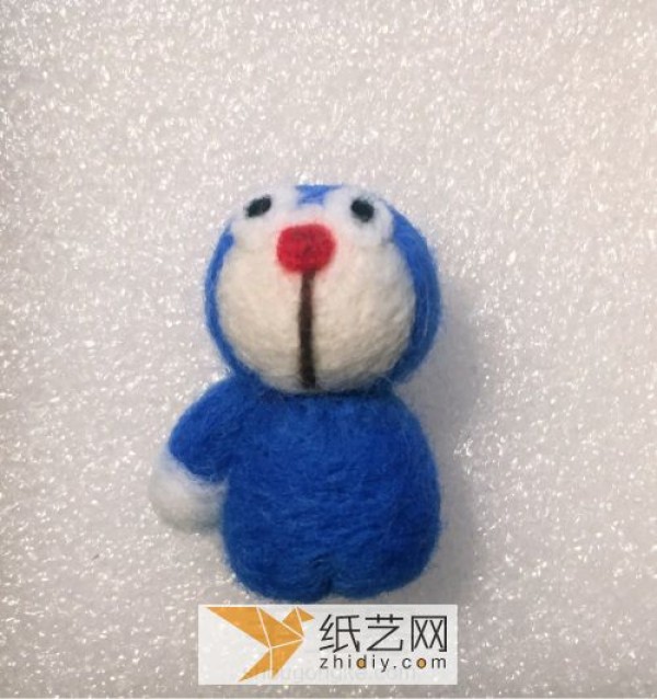 Detailed tutorial illustration of making a Doraemon doll made of wool felt as a Mid-Autumn Festival gift