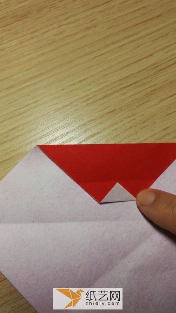 Real photos of how to make an origami Santa Claus that is simple and easy for children to learn