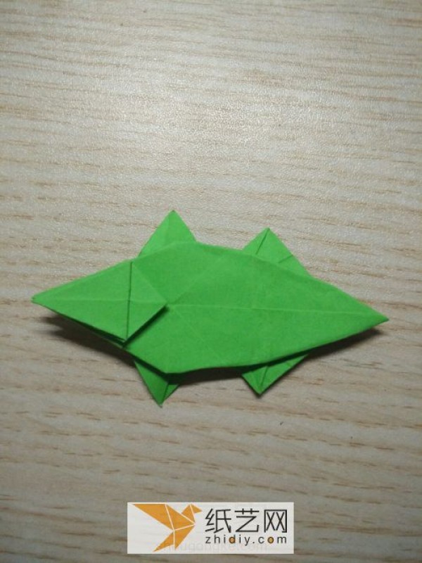 Tutorial on how to make an origami crocodile in Childrens Origami Collection