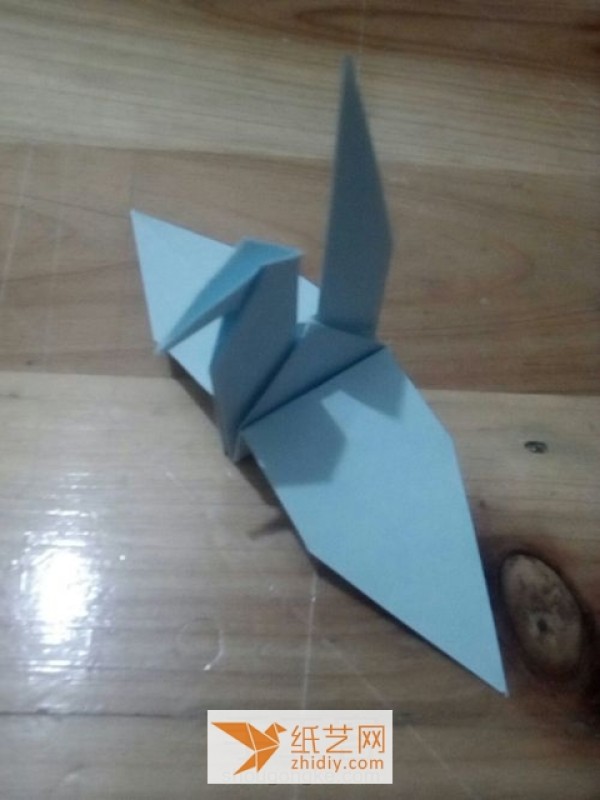 Innovative tutorial on how to make a flying origami crane