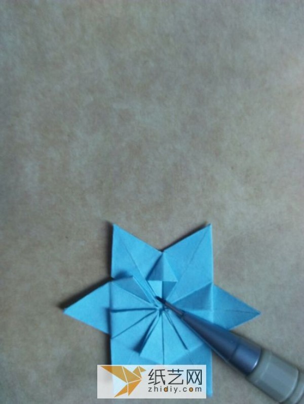 You can also fold a piece of paper into three-dimensional snowflakes!