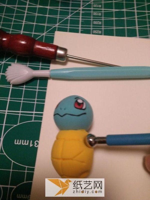 Illustrated tutorial on making DIY Pokemon Squirtle from clay. Cartoon dolls made of clay.