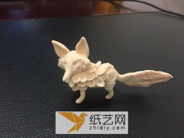 Cute little fox made of ultra-light clay