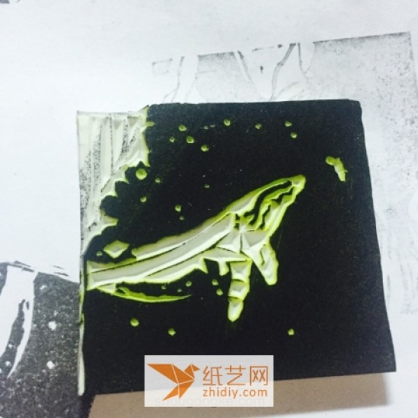 Tutorial on how to carve a whale out of a rubber stamp