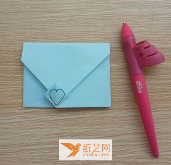 Wrap your Christmas cards in these cute origami envelopes for kids