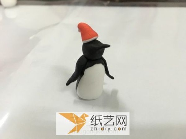 Illustrated handmade tutorial for making Christmas clay penguins and clay gifts