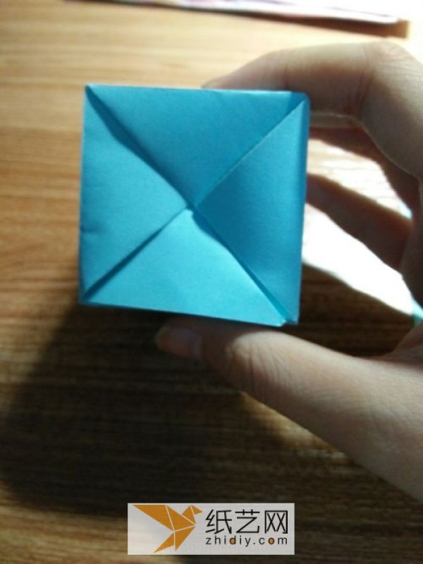 An educational three-dimensional square origami