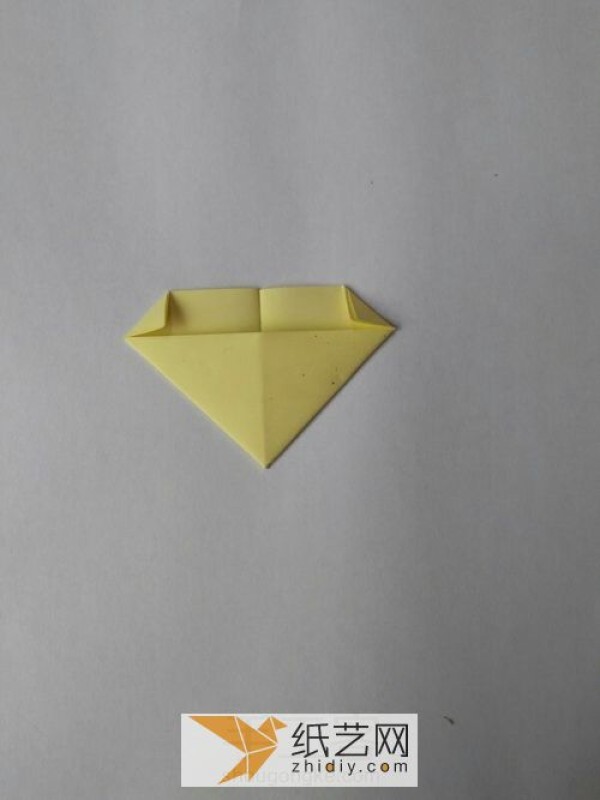 Super cute origami triangle with minion