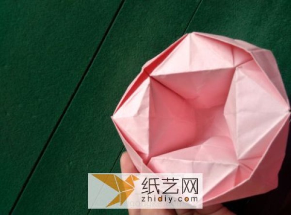 The wine glass origami rose transforms into a beautiful origami basket in just a few steps