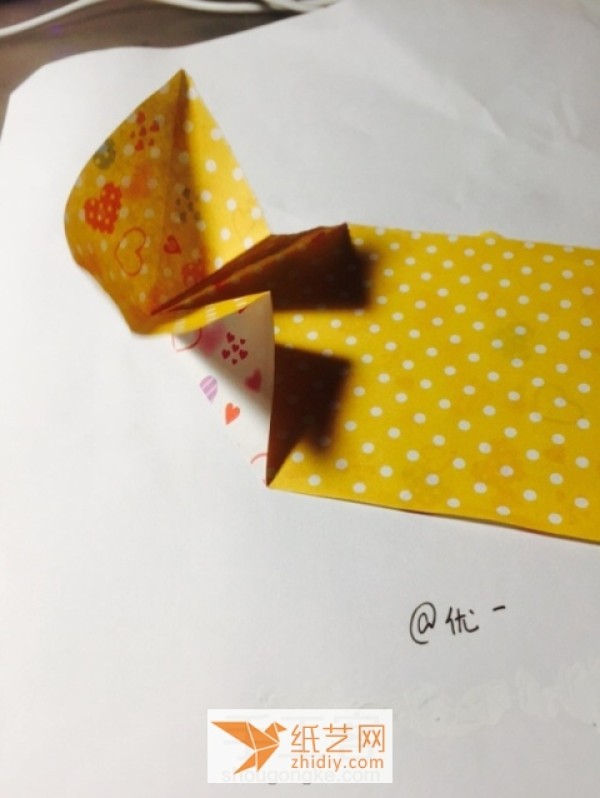 A little surprise for Valentines Day. Tutorial on how to make origami heart hairpins.