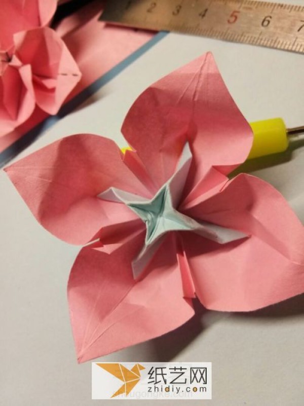 Simple origami flowers are the icing on the cake for Teachers Day gifts