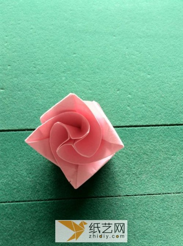 The wine glass origami rose transforms into a beautiful origami basket in just a few steps