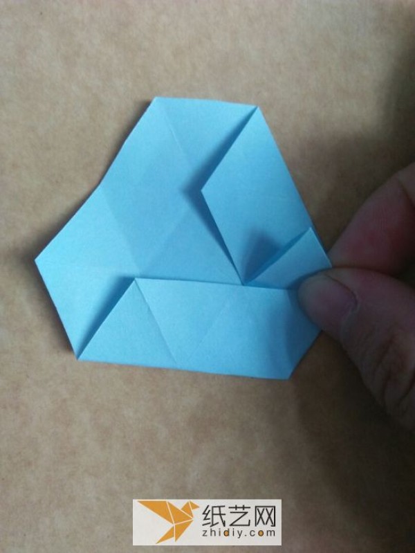 You can also fold a piece of paper into three-dimensional snowflakes!