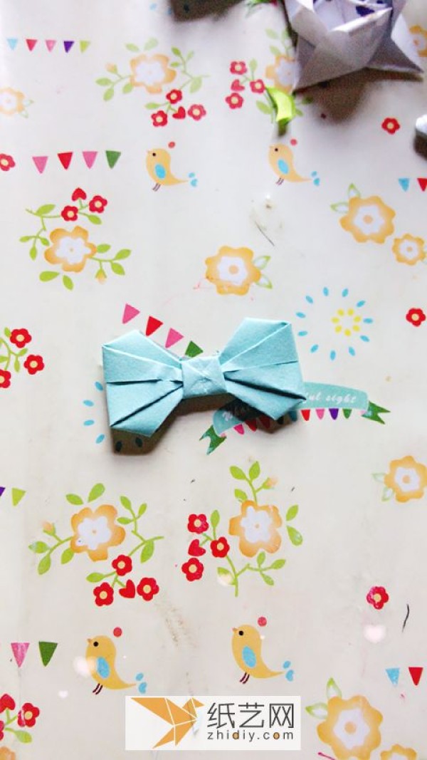 Illustrated origami tutorial for origami butterflies and origami bows