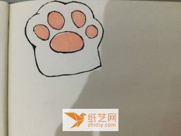 Beginners tutorial on making puppy paws with colored rubber stamps