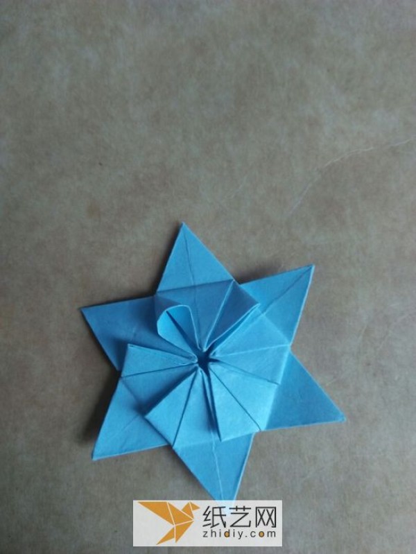 You can also fold a piece of paper into three-dimensional snowflakes!