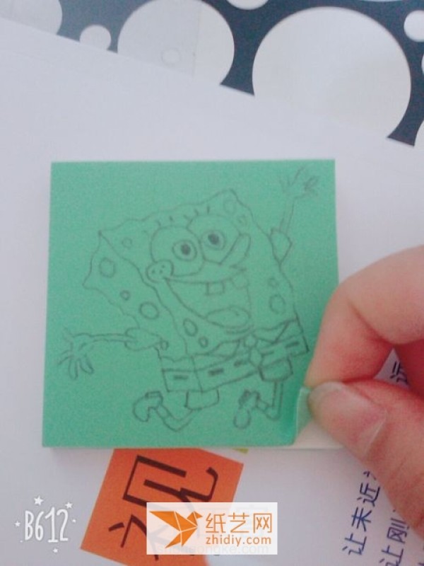 Use rubber stamps to create a Spongebob seal as a New Year’s gift