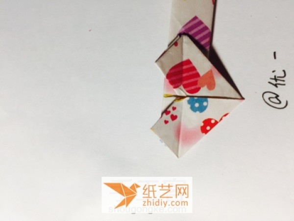 A little surprise for Valentines Day. Tutorial on how to make origami heart hairpins.