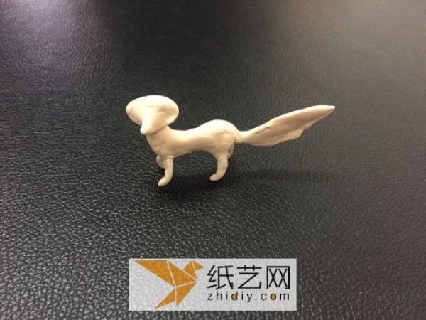 Cute little fox made of ultra-light clay