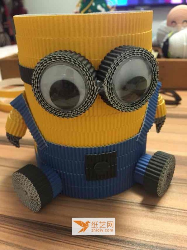 Use corrugated paper to make handmade paper minion (also a tutorial on turning waste into treasure)