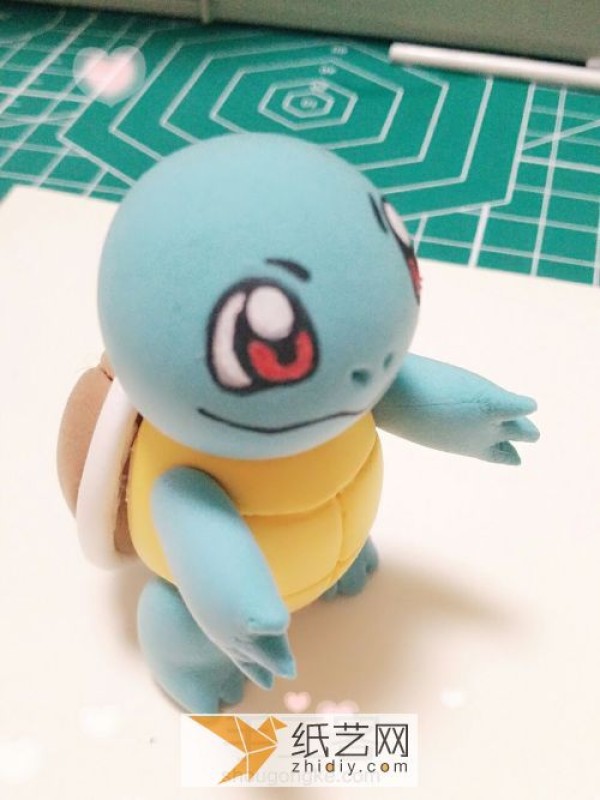 Illustrated tutorial on making DIY Pokemon Squirtle from clay. Cartoon dolls made of clay.