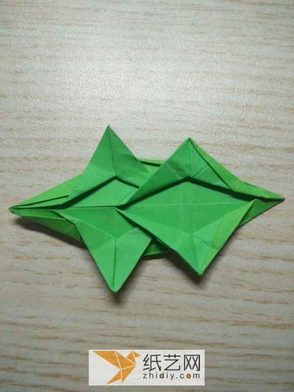 Tutorial on how to make an origami crocodile in Childrens Origami Collection