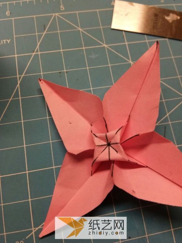 Simple origami flowers are the icing on the cake for Teacher’s Day gifts