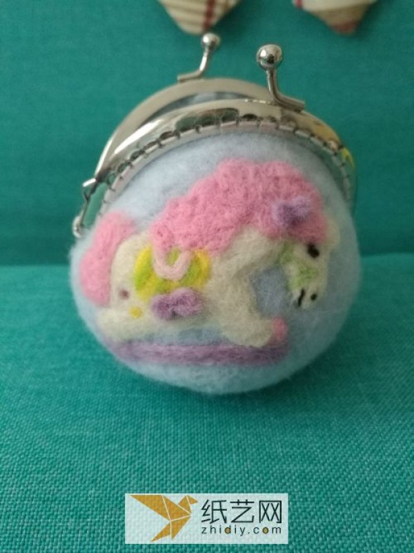 Mothers Day gift made of wool felt with wooden horse mouth and gold-wrapped coin purse