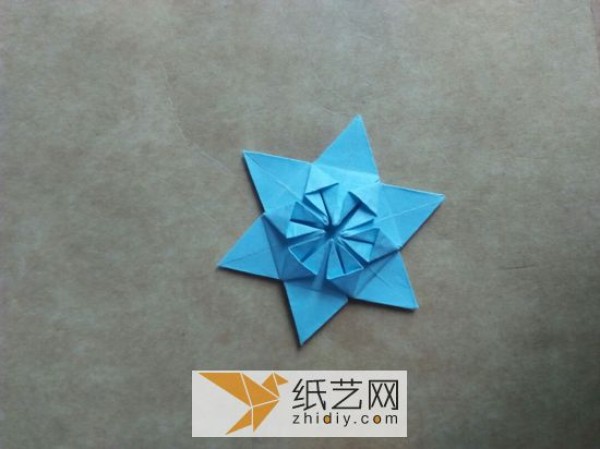 You can also fold a piece of paper into three-dimensional snowflakes!