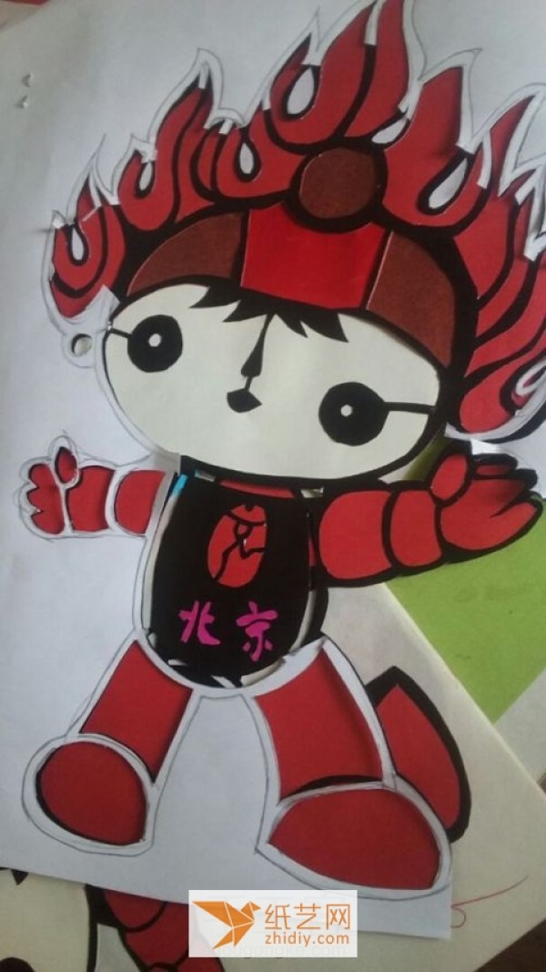 Illustrated tutorial for beginners to color paper-cutting and making Fuwa Huanhuan