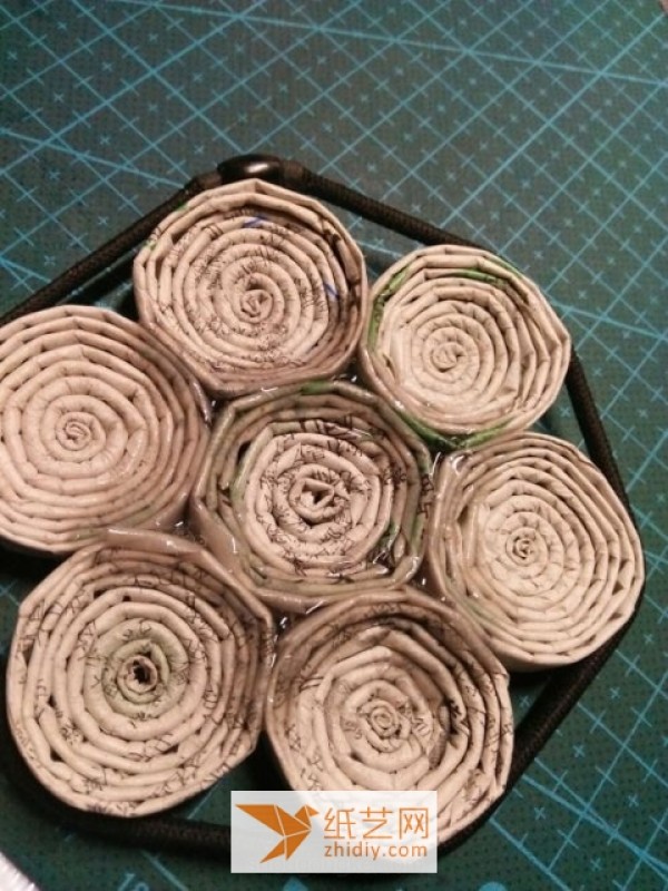 Super simple tutorial on turning old newspapers into treasures and making coasters