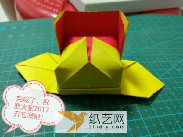 Follow the tutorial and learn to make origami and get an official hat. I wish you a promotion and a fortune in 2017!