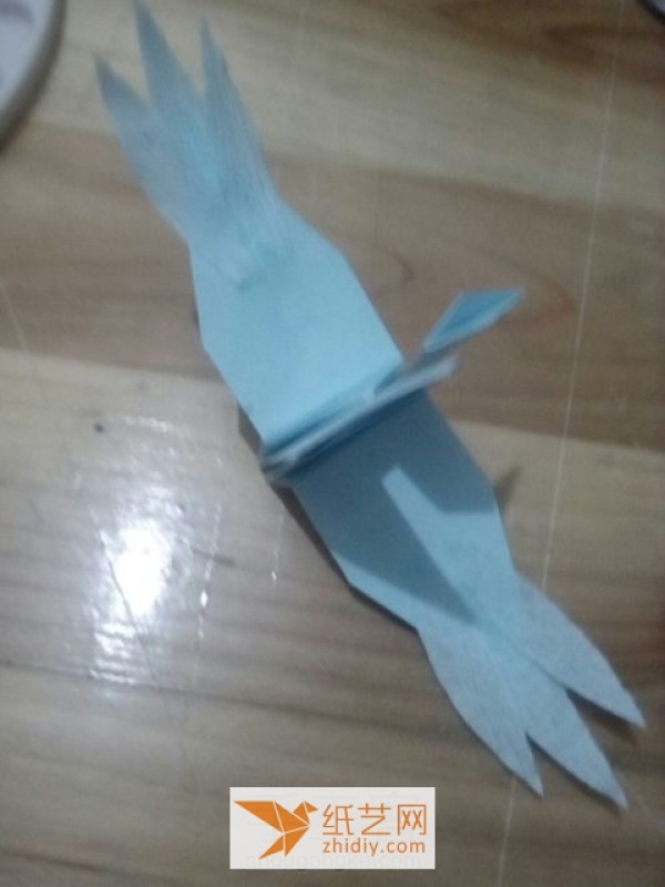 Innovative tutorial on how to make a flying origami crane