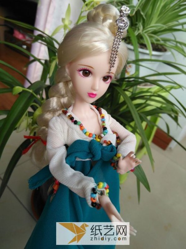 In the New Year, the doll will be given a Korean dress made of handmade fabrics.