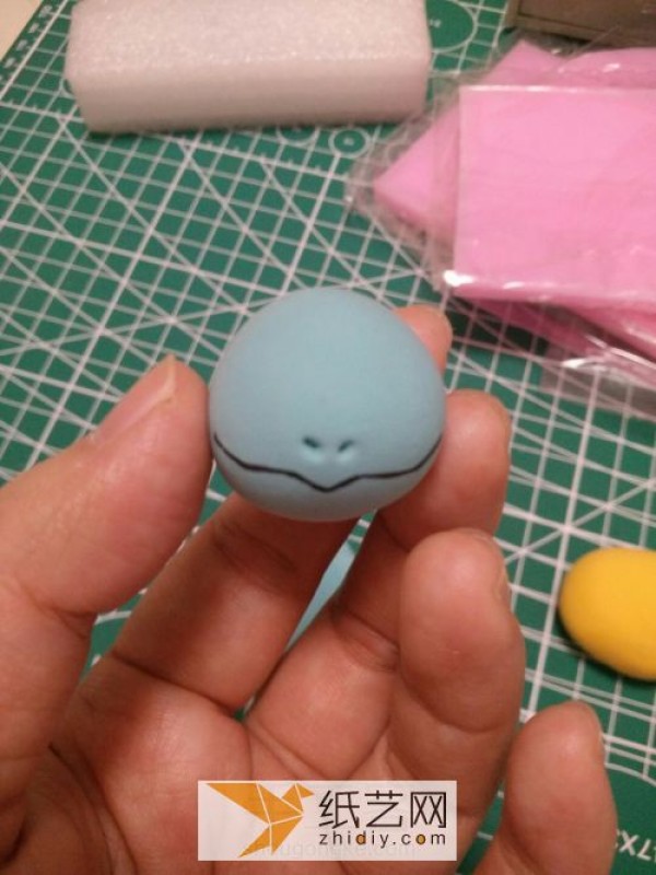 Illustrated tutorial on making DIY Pokemon Squirtle from clay. Cartoon dolls made of clay.