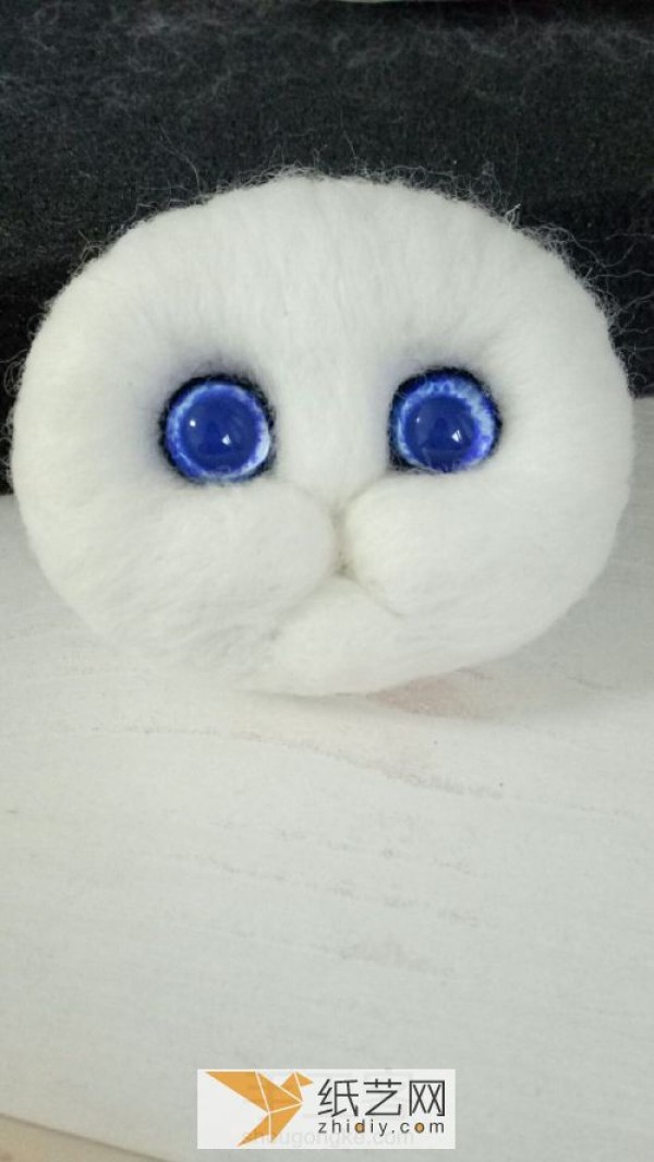 Illustrated tutorial on how to make a cute and cute wool felt poke kitten