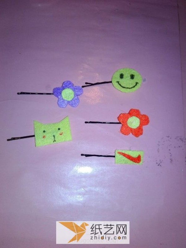 Children make their own non-woven hairpins as Children’s Day gifts for friends